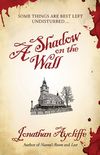 A Shadow on the Wall: A Novel